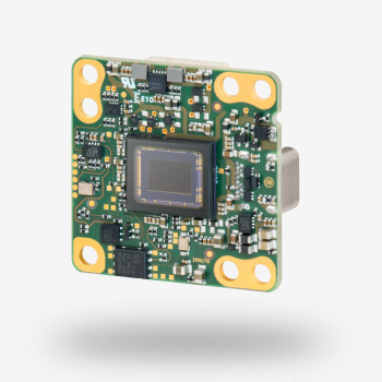 uEye LE ボードレベルカメラ、グレーの背景の前。