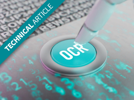 ロボットの指が「OCR」と書かれたボタンに近づきます。