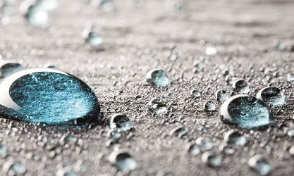 水滴のクローズアップ、矢印のついた箱のシンボル。